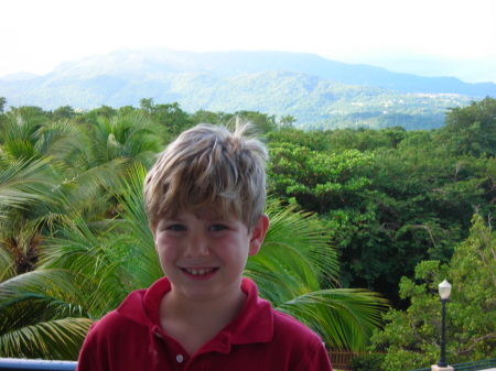 Joey with El Yunque rainforest behind him