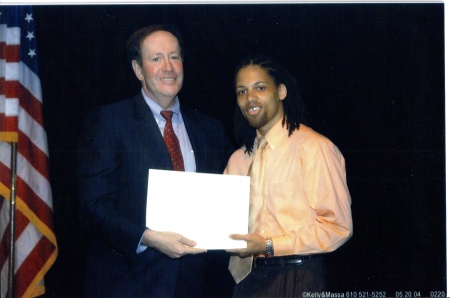 Otis presented the Greg R. Wiegand Award by the Dean of Temple Law School