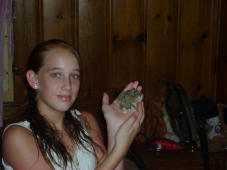my precious daughter Julie 14yrs.old 8-8-07 with her hamster