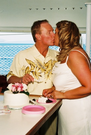 Us kissing after cake cutting