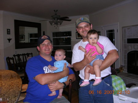 My husband Paul, right, with our daughter Abigail, and friend Jordan, left, with his son J.T.