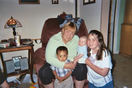 Me and 3 of my 12 grandbabies