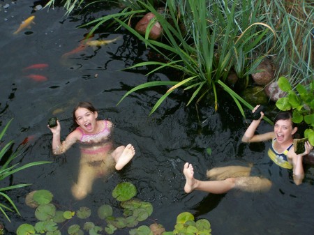 rachel and alyssa in our pond!