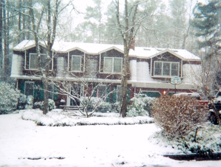 Our House and 1st winter...We miss the beach!!