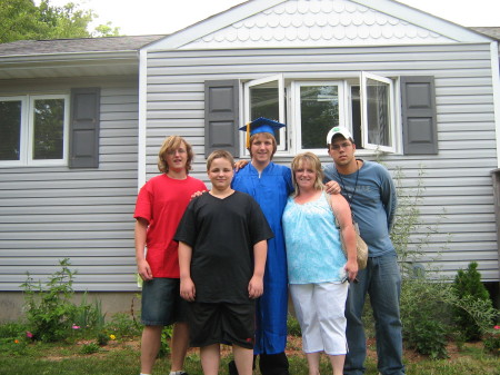 My boys and me in front of my house