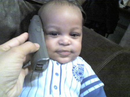 EJ learning to use the phone early!