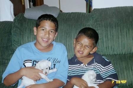 Marc & Isaiah with the puppies