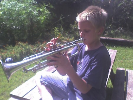 John playing Carl's trumpet