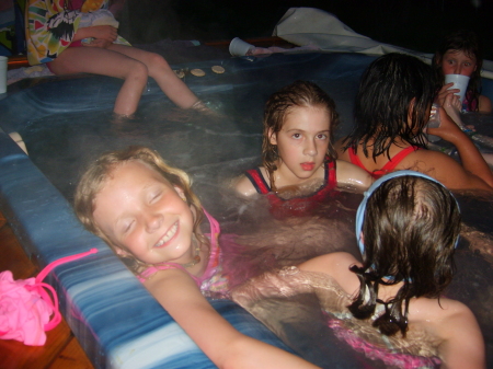 Abi (9) relaxing with friends in the Hot tub
