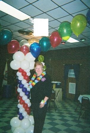Louise near decorative balloon post