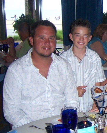 Our son, Lee and his son, Cogan    Virginia Beach July 2006