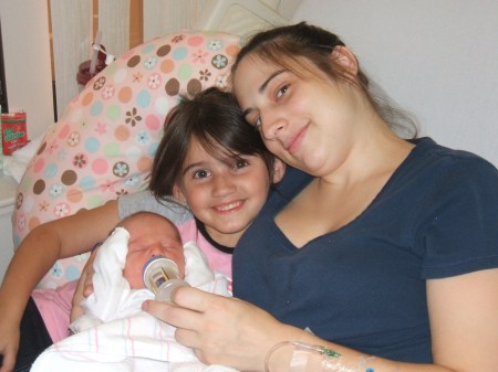 Mama, big sister Adriana and baby Ashley