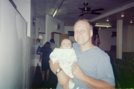 Peter holding Nathaniel.