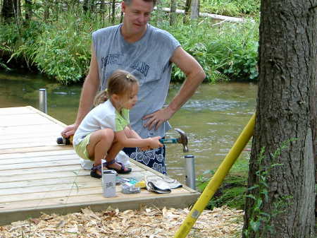 Tatum helping Grandpa