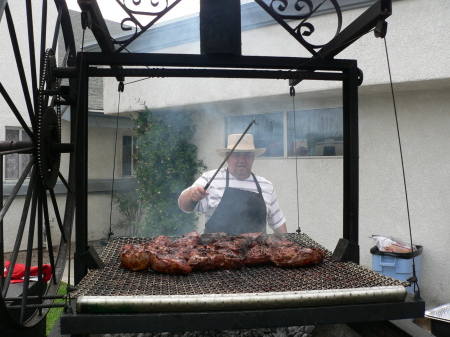 My husband Carl cooking for 300 people at a Fundraiser Event