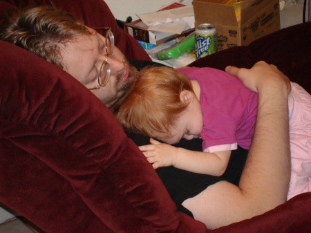 Claire sleeping on Daddy