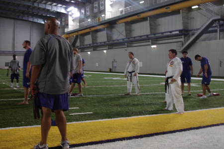 Training the LSU football team at the indoor practice facility