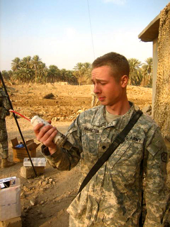rory holding an IED