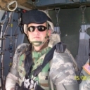 Patrick in a black hawk over Iraq