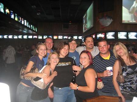 the crew cheering the saints on in tampa