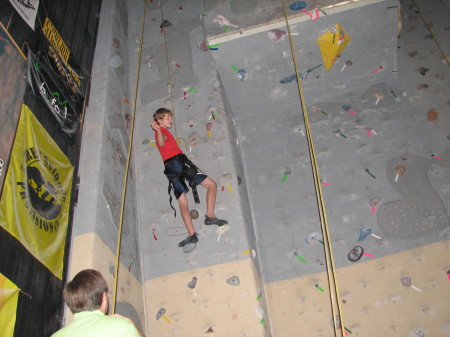 Chris rock wall climbing