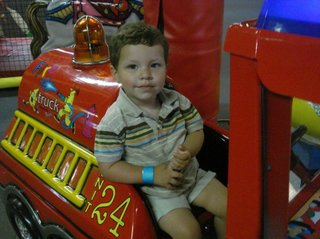 Nicholas in the fire truck
