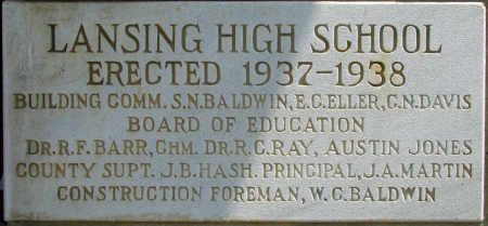 Plaque on rock building of old Lansing High School