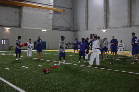 Training the LSU football team at the indoor practice facility