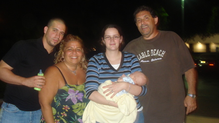 My Son-in law daughter with my grandchild and my brother-in law and his new wife