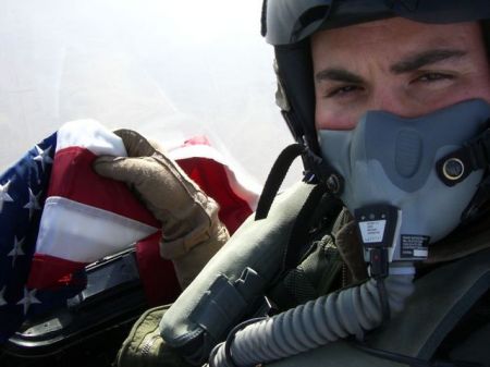 My son Greg flying the American flag across Iraq