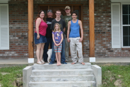 Our family in front of our new home 2010