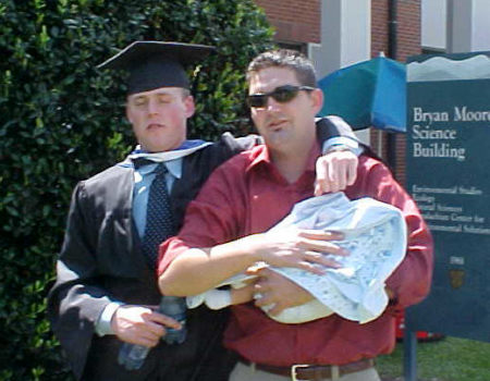 My boys Chris (the graduate) and Stephen with grandson #2 (Payten)