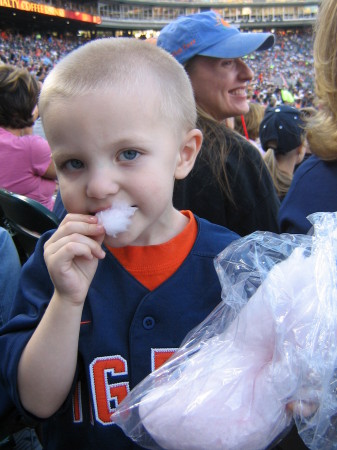 Patrick enjoying cotton candy at his first Tigers game