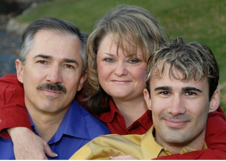 (L to R) My husband, Jim; me; my son, Christopher (2007)