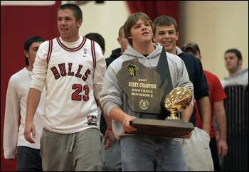 Kris Roug with State Trophy (Post Cresent Appleton Wisconsin)