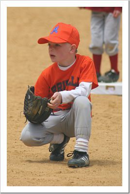 Ben playing baseball