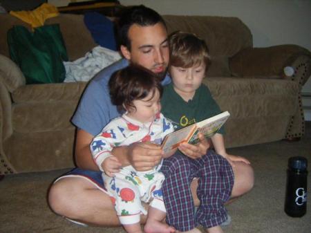 Dominic reading to his boys