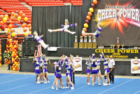 Emilee flying at cheer competition