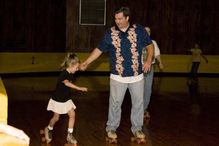 Brier and Daddy skate "dancing"