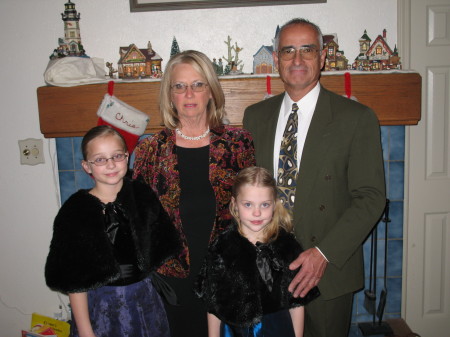 with our granddaughters Sarah and Emily-Christmas 06'