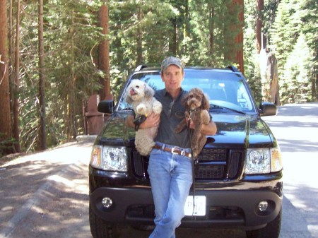 Chucky(brown dog), Lenny (who died), my truck, and I.