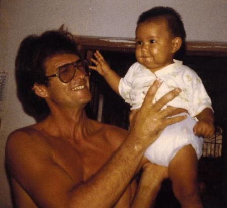 John with daughter Genoa in 1984 in Mexico