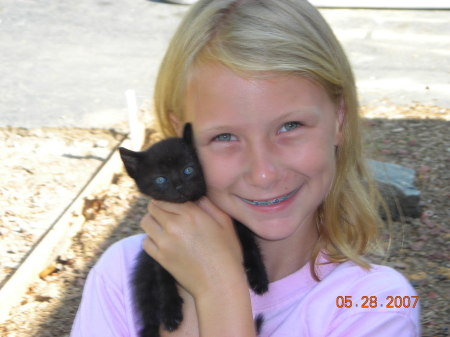 Emileigh our baby with one of her baby kittens
