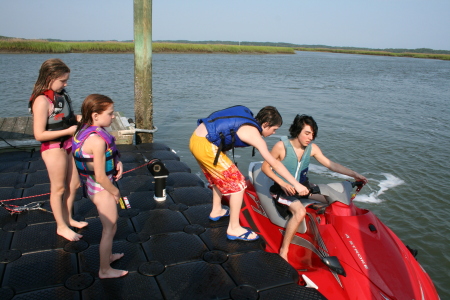 The kids playing in the water