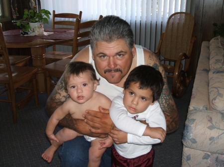 Papa holding his grandsons...