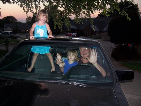 Papa and his "grand girls"waving at you!