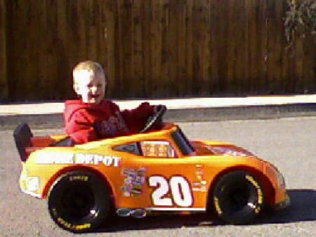 My boy driving his first Power Wheels.