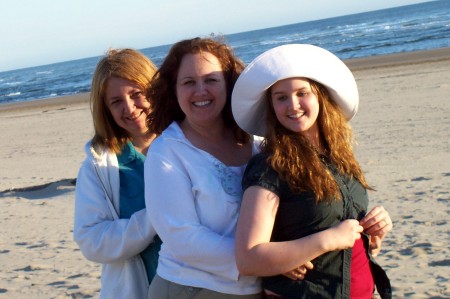 Three generations enjoying Canon Beach on the Oregon coast.