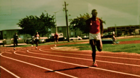 DOUGLAS J. STRETCHING OUT IN DA 400 METERS...