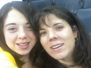 Shelbie and me at a hockey game.  Go Checkers!